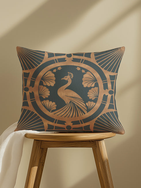 Square pillow cover featuring a stylized copper peacock design centered in a medallion, surrounded by Art Deco fan patterns and shell motifs on a dark forest green background.